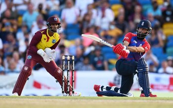 Moeen Ali of England plays a shot as Nicholas Pooran of West Indies keep during the T20 International Series Fourth T20I match between West Indies and England at Kensington Oval on January 29, 2022 in Bridgetown, Barbados. 
