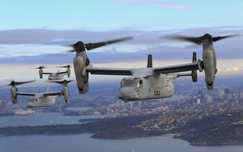 Three MV-22B Osprey tiltrotor aircraft, of the kind in the accident on Sunday, flying in formation above the Pacific Ocean off the coast of Sydney