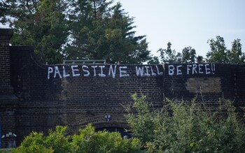 Graffiti sprayed on a railway bridge in Golders Green, north London